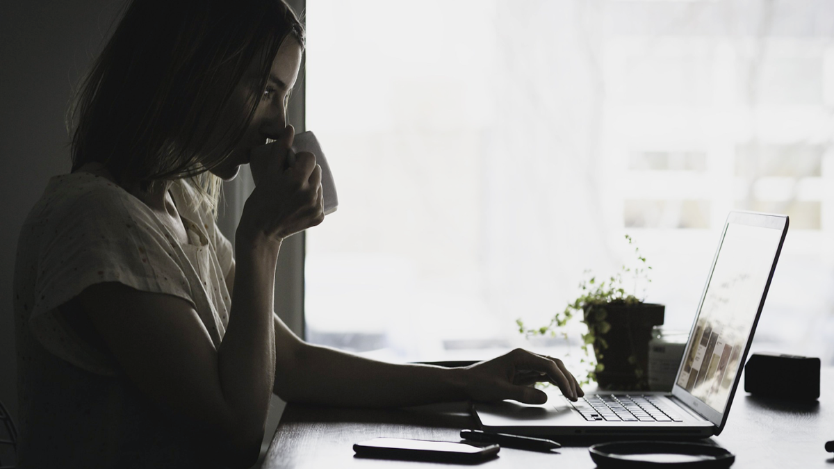 A woman searching on a computer