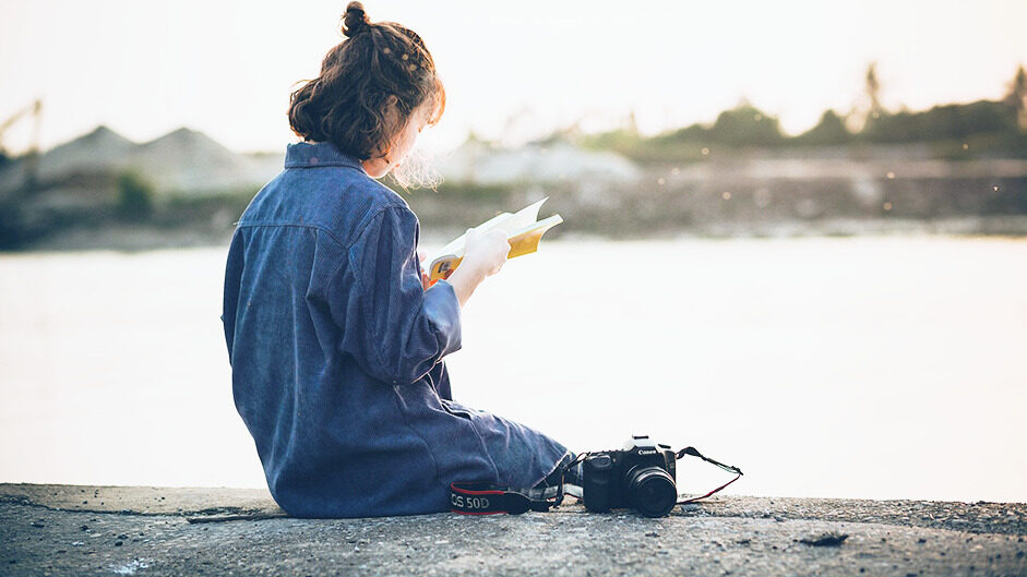 woman reading an introductory book_